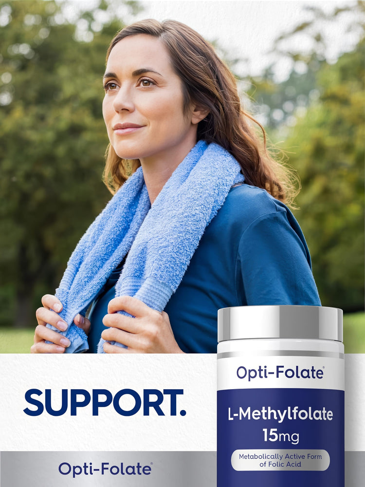 Woman outdoors with a towel around her neck beside a bottle of L-Methylfolate.