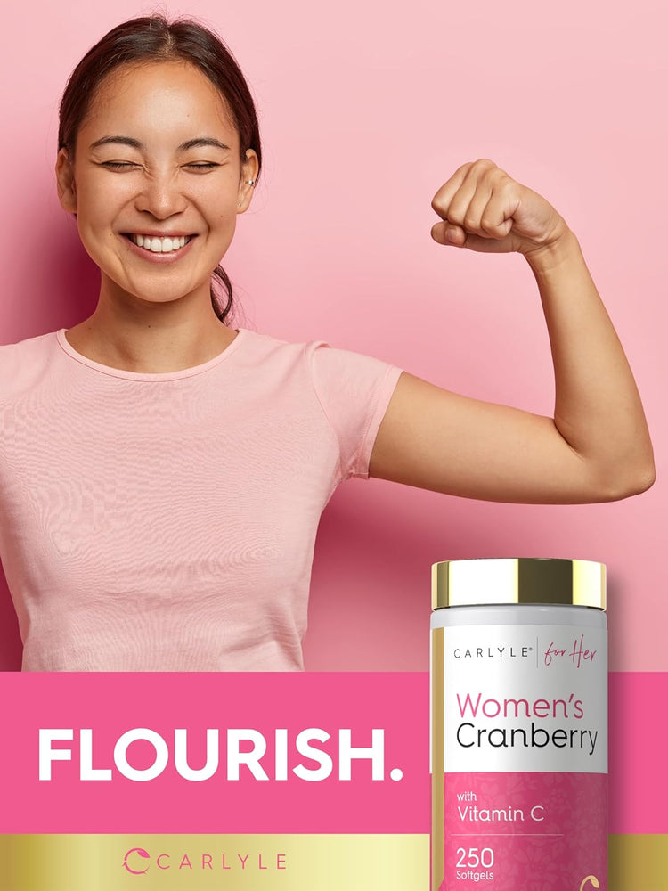 Smiling young woman flexes her bicep next to a bottle of Women's Cranberry supplement.