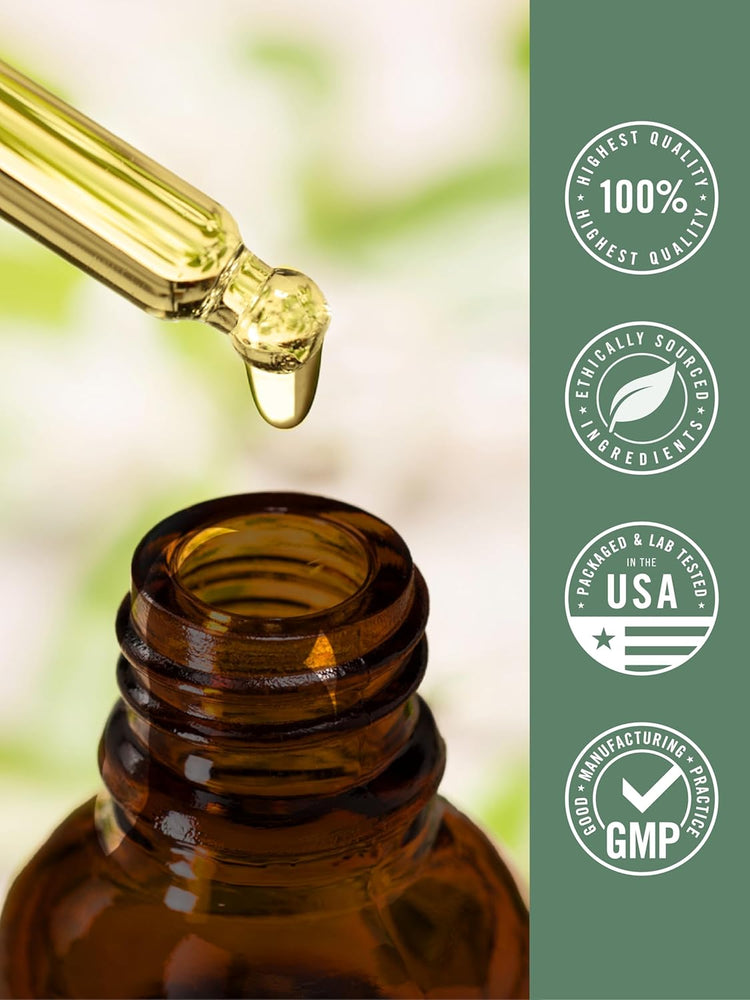 Carlyle Liquid Turmeric Plus Ginger 2 oz dropper bottle with a liquid drop falling from the pipette.
