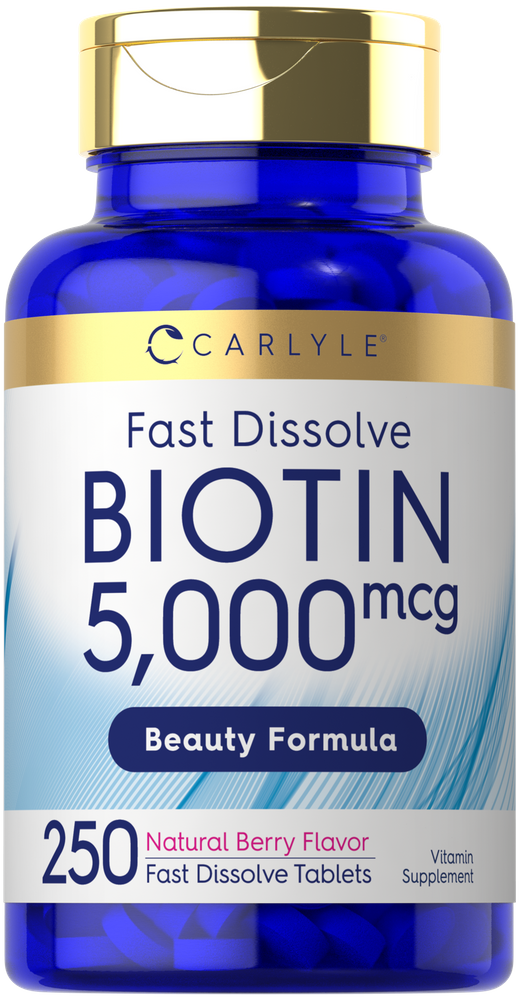 Carlyle Fast Dissolve Biotin, 5,000 mcg, 250 tablets, shown on a hand scale for size comparison.