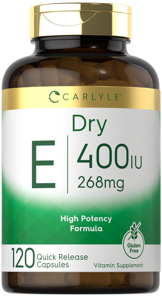 Carlyle Dry Vitamin E 400 IU bottle with 120 quick release capsules shown on a hand scale.