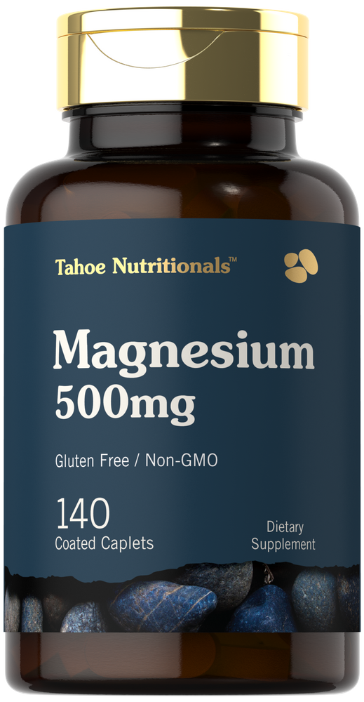 Magnesium 500mg bottle containing 140 coated caplets resting on a hand scale, showing its bulk size for easy measurement.