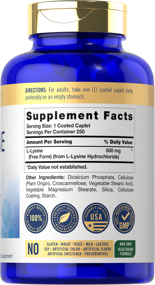 A hand holding a bottle of L-Lysine 500 mg coated caplets, containing 250 tablets, indicating size and scale of the supplement package.