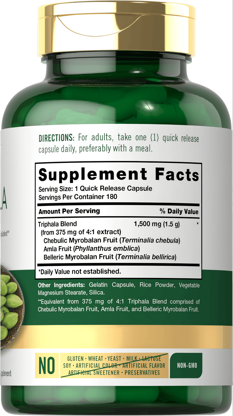 Hand holding a bottle containing 180 Triphala 1500 mg quick release capsules.