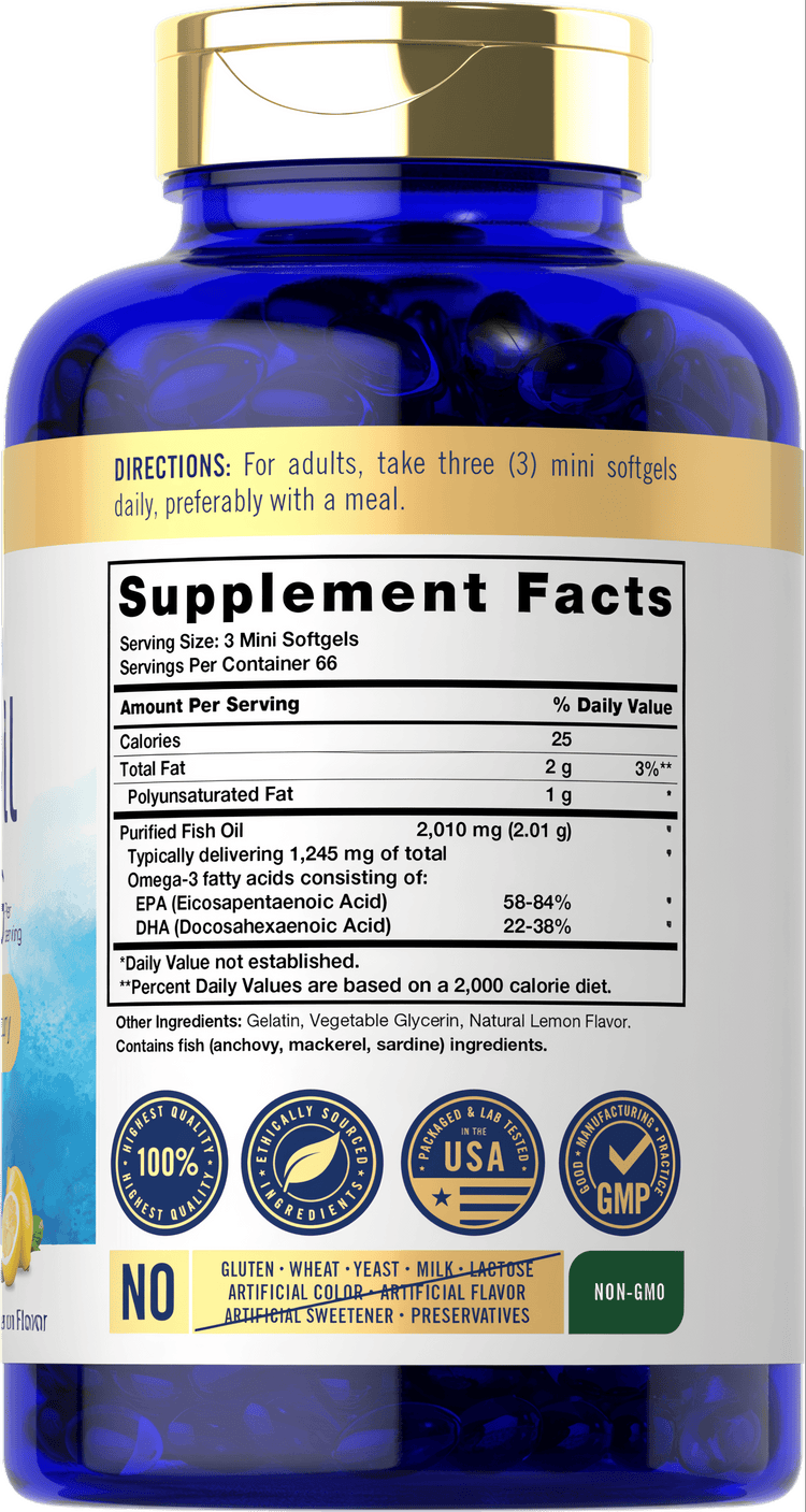 Hand holding bottle of Mini Omega-3 Fish Oil, 2010 mg softgels, bulk scale.