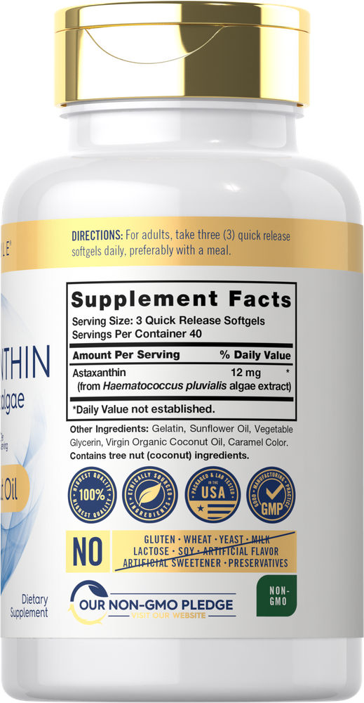 A bulk scale of Carlyle Astaxanthin 12 mg softgels, showing 120 count bottle in a hand for size reference.