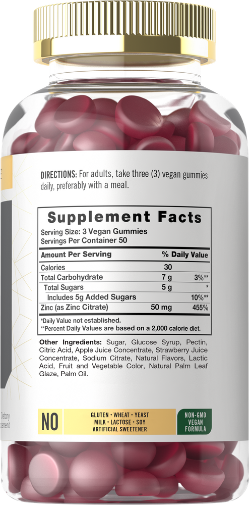 A clear jar filled with vegan Zinc 50 mg gummies, red and round in shape.