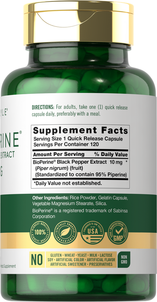 10 mg CL Bioperine green capsules shown in hand on scale to display size comparison.