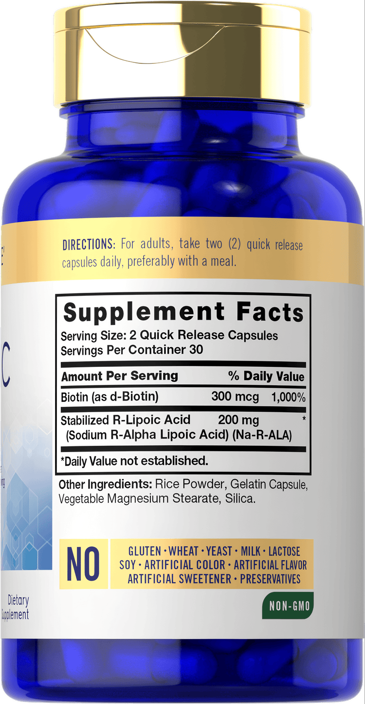Hand holding a bottle of Carlyle R-Lipoic Acid 200 mg, containing 60 capsules.