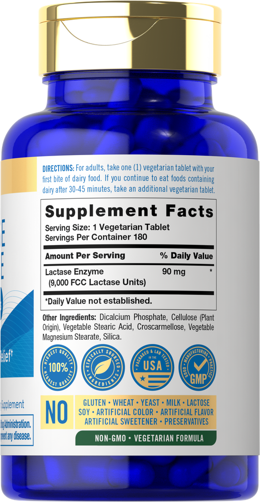 Vegetarian tablet of Carlyle Dairy Relief FA Lactase 9,000 Units shown on a hand scale.