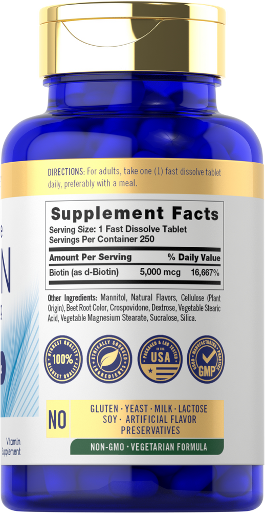 Biotin 5000mcg fast dissolve tablets, 250 count, shown on a hand scale for size reference.