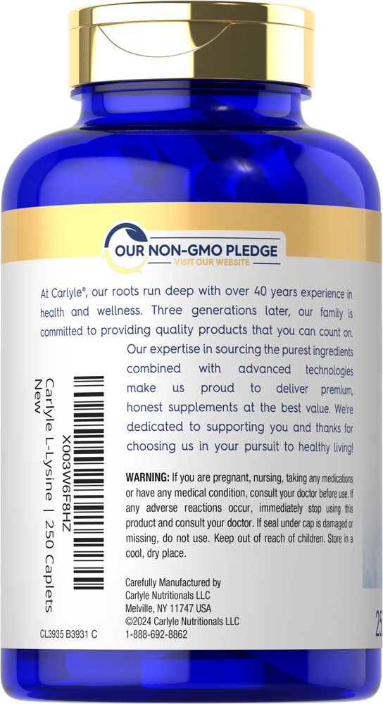 Hand holding Carlyle L-Lysine 500 mg bottle with 250 caplets indicating supplement size and quantity.