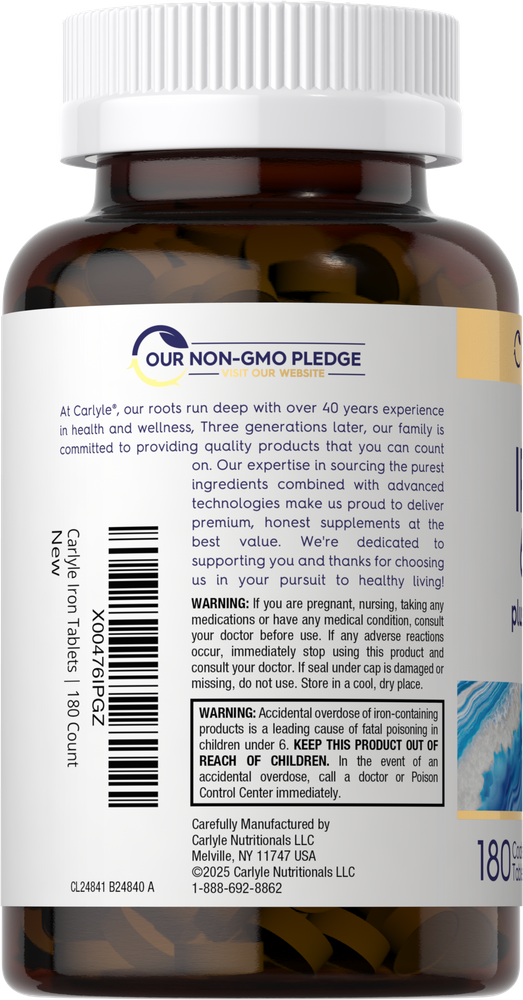 Hand holding Carlyle Iron + Vitamin C bottle, containing 180 tablets, emphasizing supplement quantity and packaging.