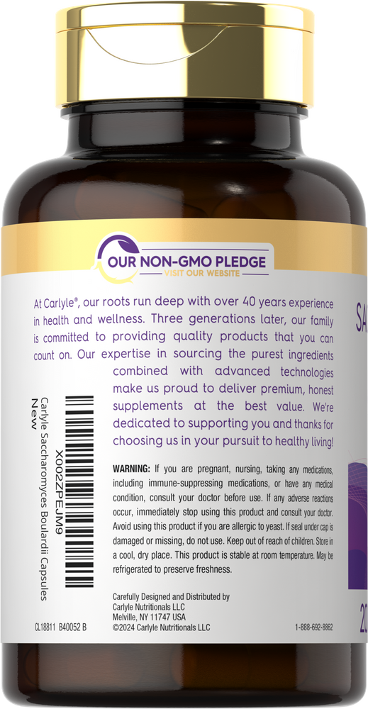 Hand holding a bottle of Carlyle Saccharomyces Boulardii, containing 200 vegetarian capsules with 10 billion CFU.