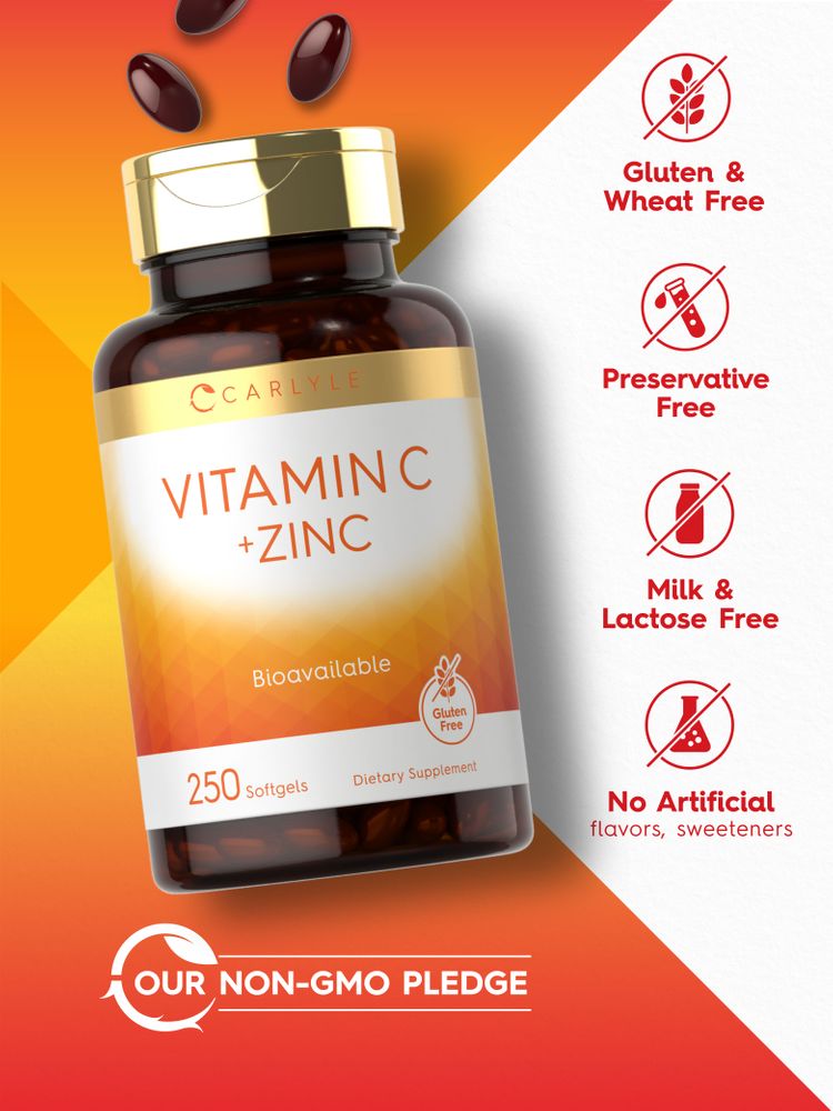 Hand holding dark red softgels from Carlyle Vitamin C + Zinc 250 Softgels product.