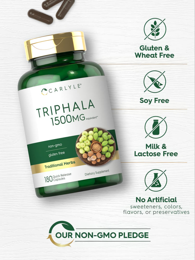 Hand holding a scale with dark brown capsules, labeled Triphala 1500mg Quick Release.