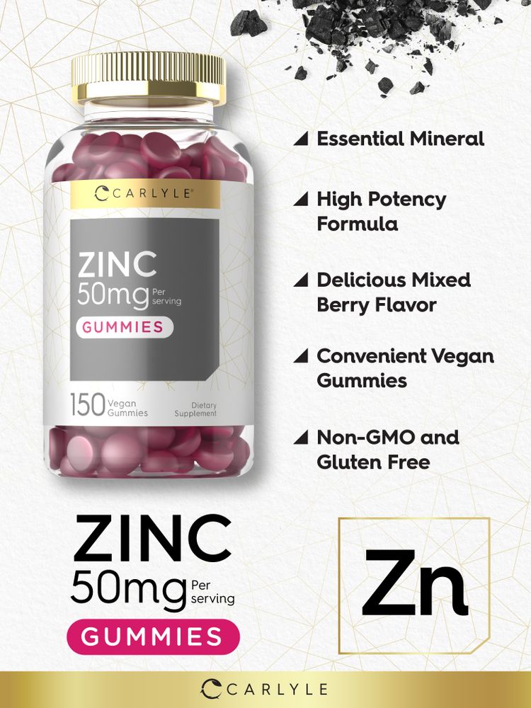 A hand holding reddish-purple Zinc 50 mg mixed berry flavored gummies on a bulk scale.