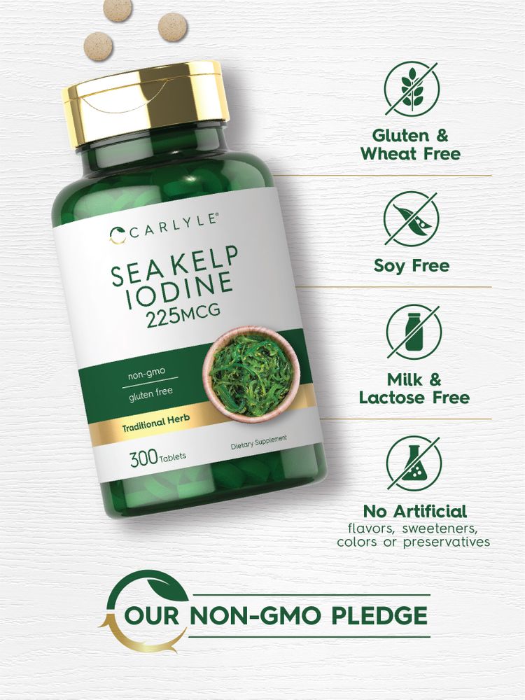 Hand holding Carlyle Sea Kelp Iodine bottle containing 225mcg tablets, with 300 tablets total, for iodine supplementation.