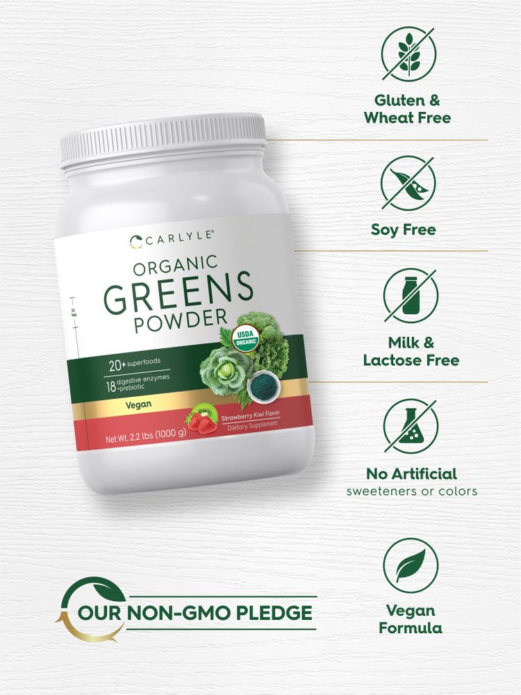 A jar of Organic Greens Kiwi Powder weighing 2.2 lbs (1000 g) is held by hand, showing its bulk size and vibrant green color.