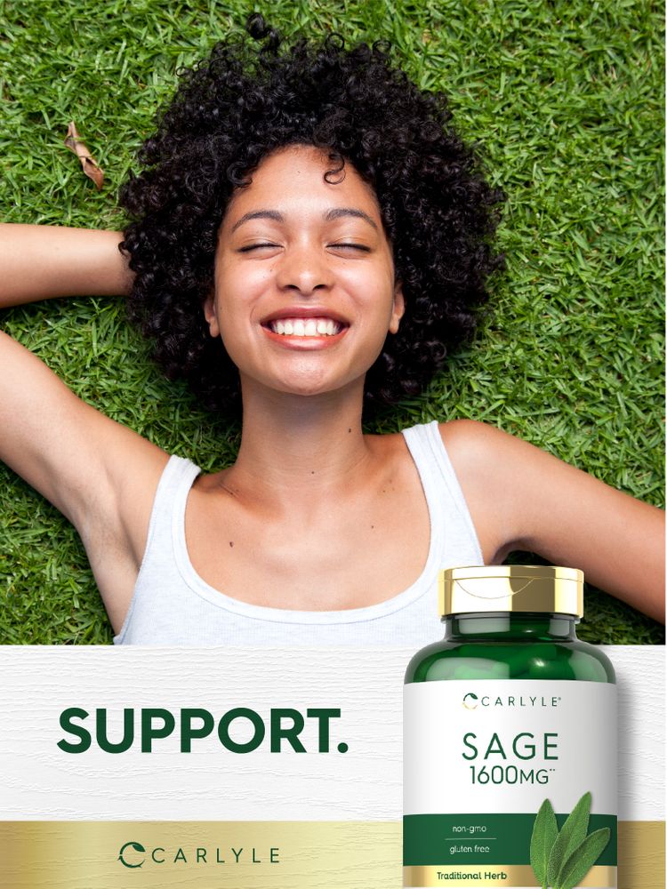 Young adult woman smiling with closed eyes on grass next to a bottle of Carlyle Sage 1600mg.