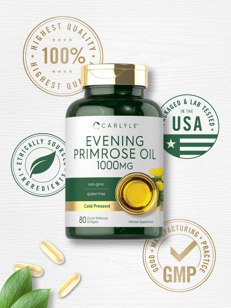 Yellow 1000 mg Evening Primrose Oil softgels scattered on white surface with green leaves.