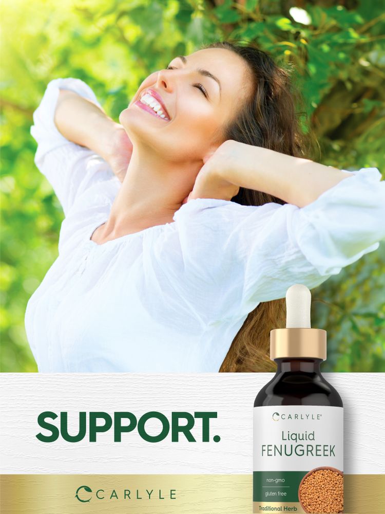 A young adult woman smiling with eyes closed, arms behind her head, enjoying the outdoors with a Carlyle Liquid Fenugreek bottle.