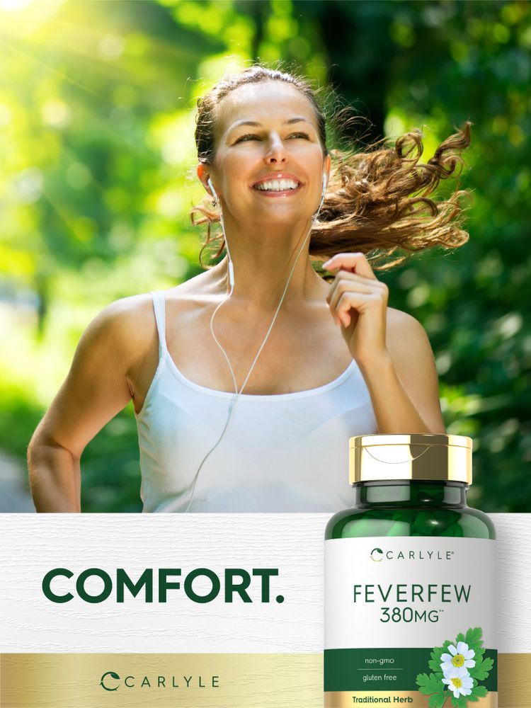 Woman jogging outdoors, smiling, wearing earphones, holding a Carlyle Feverfew 380 mg bottle.