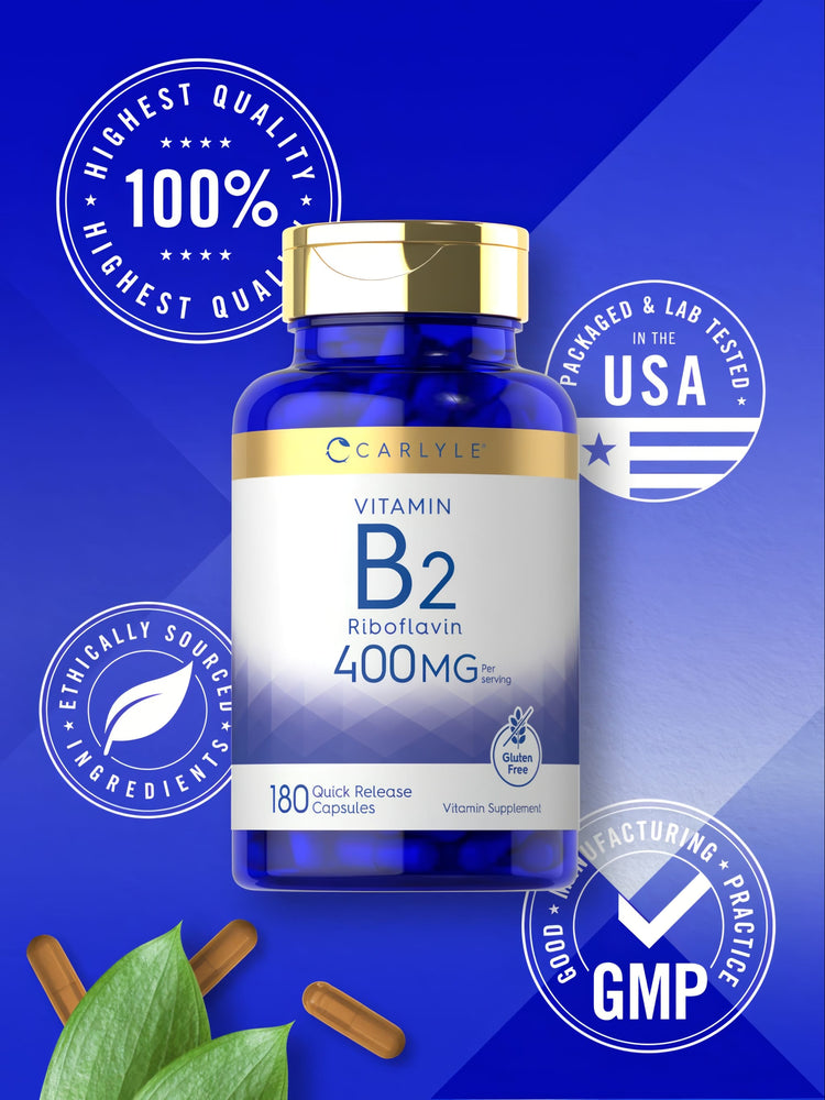 Hand holding 400MG quick release capsules in a brown container.