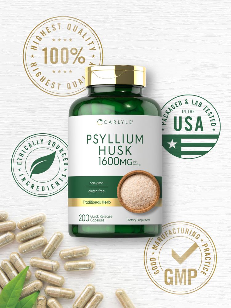 Carlyle Psyllium Husk 1600 mg Quick Release Capsules, translucent and filled with light brown powder, scattered on a white surface.