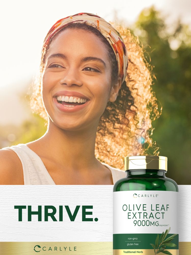 Young woman smiling outdoors next to a Carlyle Olive Leaf Extract bottle.