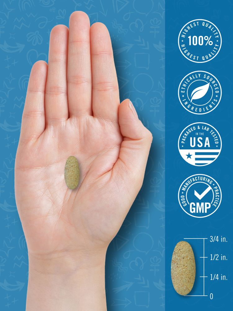 A hand holds a single multivitamin tablet, measuring three-quarters of an inch long.