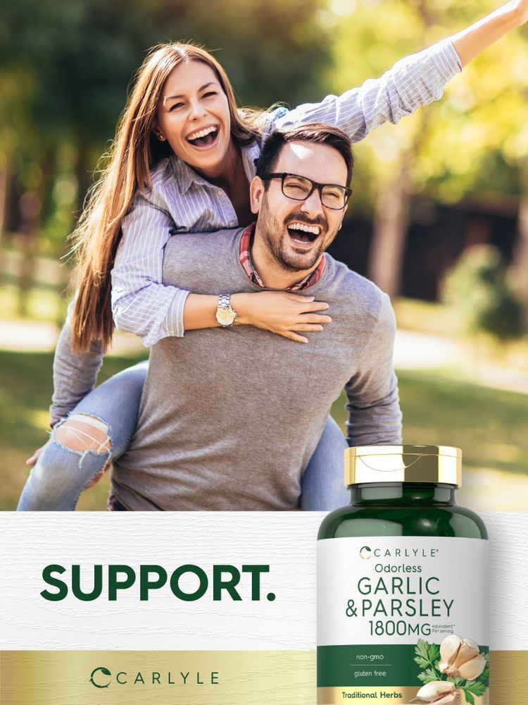 Young couple laughing and piggybacking in a park with a Carlyle Odorless Garlic & Parsley bottle.
