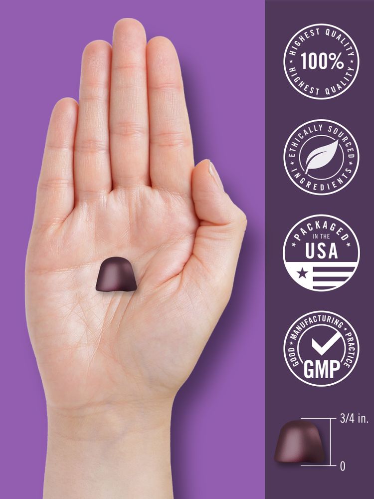 A purple bell-shaped gummy on a palm, with a ruler graphic on the right showing its height as 3/4 inch.