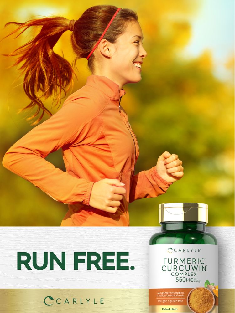 A young woman runs outside, smiling, holding a bottle of Carlyle Turmeric Curcuwin Complex.