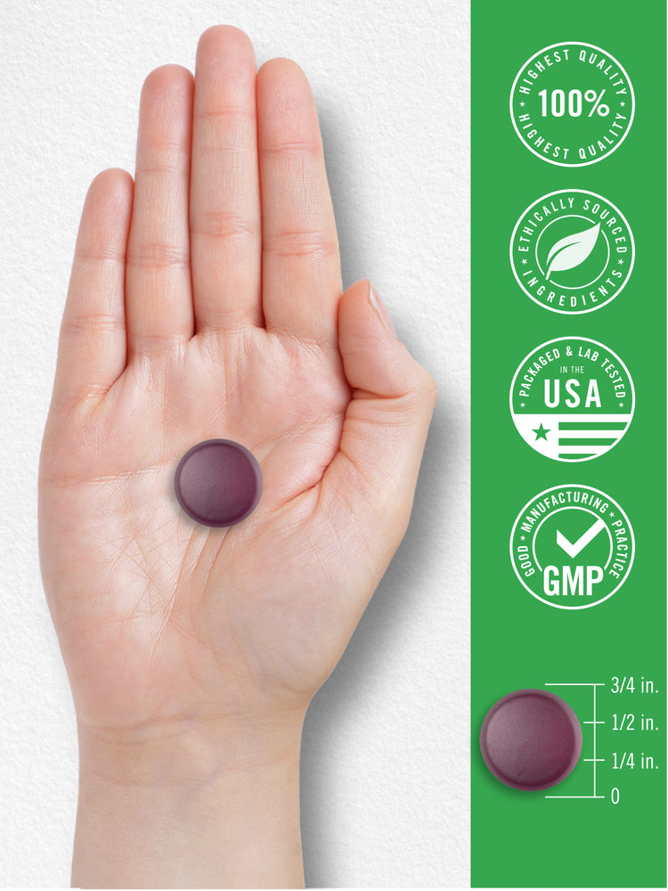 Purple round CL Kids Mag & Melatonin gummy, about 3/4 inch in diameter and 1/4 inch thick.