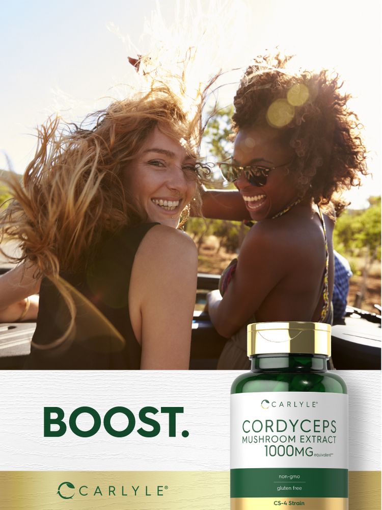 Two women laughing with windblown hair beside a Carlyle Cordyceps Mushroom Extract bottle.