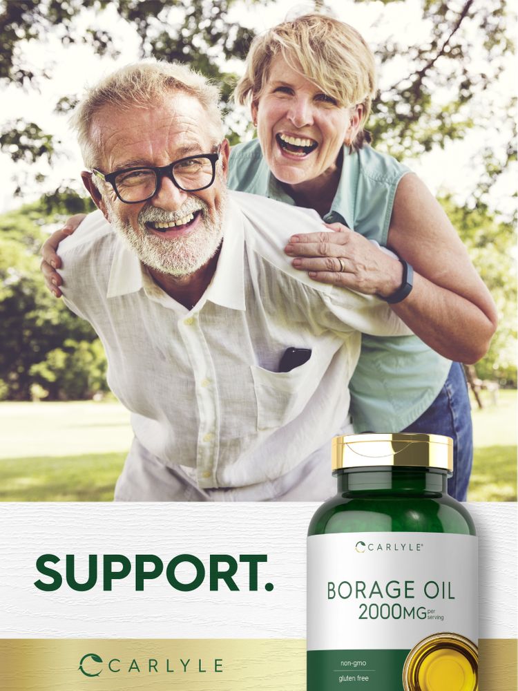 An older woman riding piggyback on a laughing man, holding a Carlyle Borage Oil bottle.
