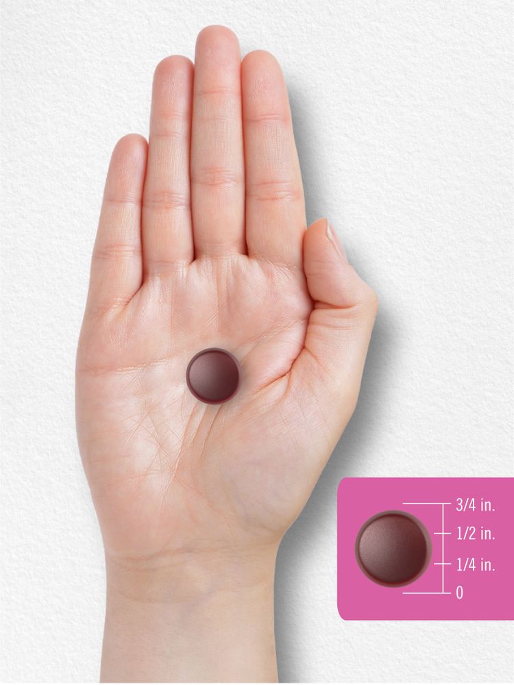 A gummy candy, 3/4 inch in diameter, shown on a hand scale for size comparison.