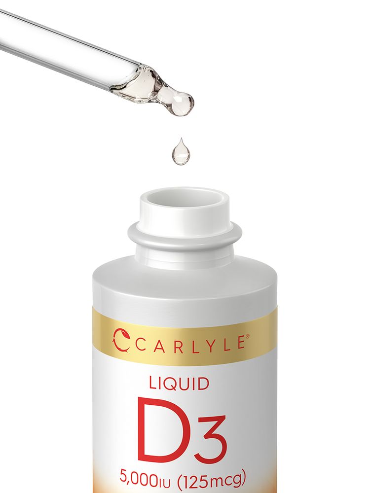 Liquid Vitamin D3 5,000 IU (125mcg) is dispensed by a dropper into a Carlyle bottle.