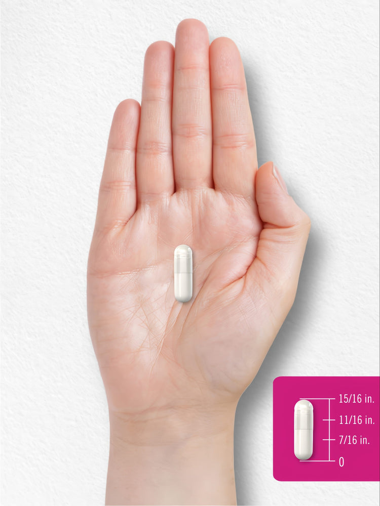 A capsule shown on a scale measuring 15/16 inches.
