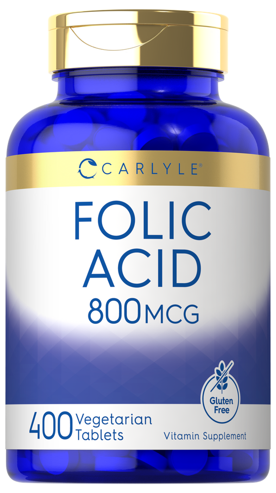 A hand holding a bottle of 400 Folic Acid 800 mcg Vegetarian Tablets.