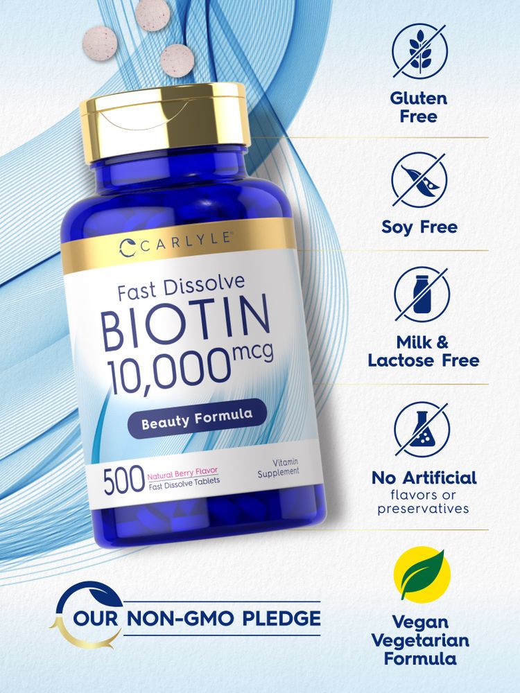 Three round, speckled Biotin 10,000mcg Fast Dissolve tablets on a hand.