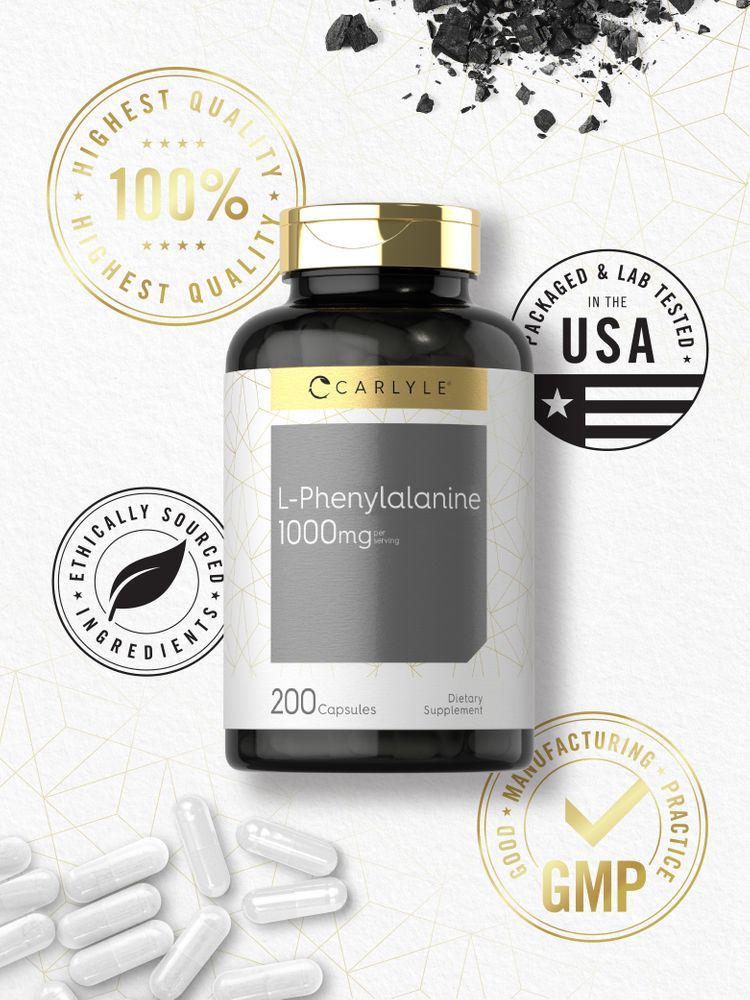Loose white capsules of L-Phenylalanine, 1000 mg, weighed on a hand scale, representing bulk measurement of supplements.