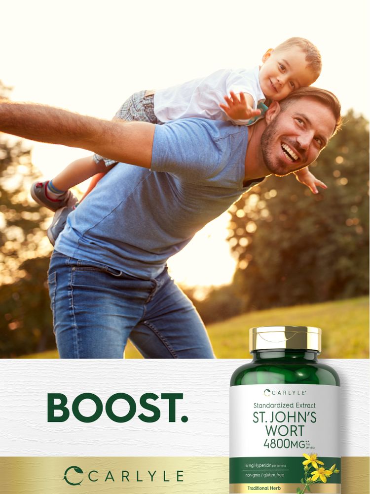 Man giving piggyback ride to a young boy in a park, holding a Carlyle St. John's Wort bottle in hand.