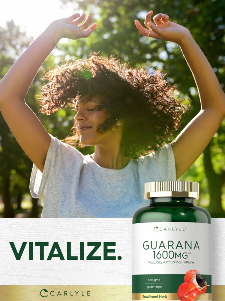 A young adult woman with curly hair, arms raised and eyes closed, enjoying sunlight in a park, with a Carlyle Guarana 1600mg bottle.