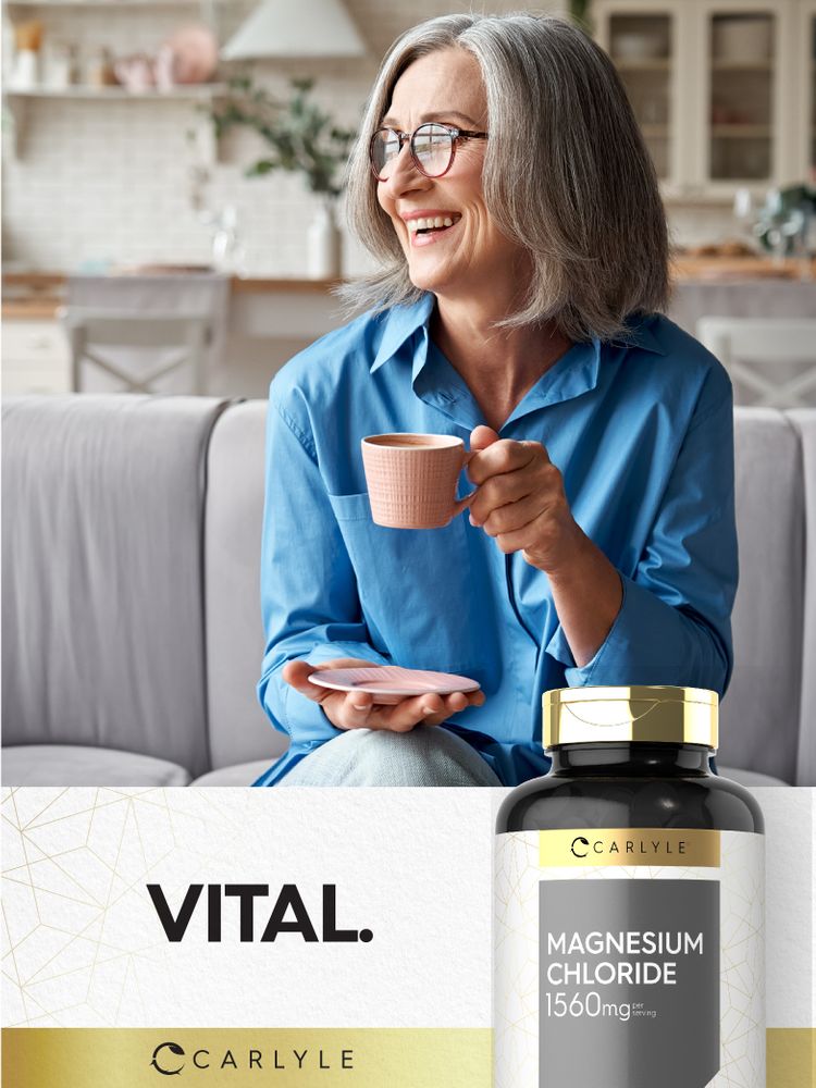 A mature woman smiles while holding a cup, with a bottle of Magnesium Chloride next to her.