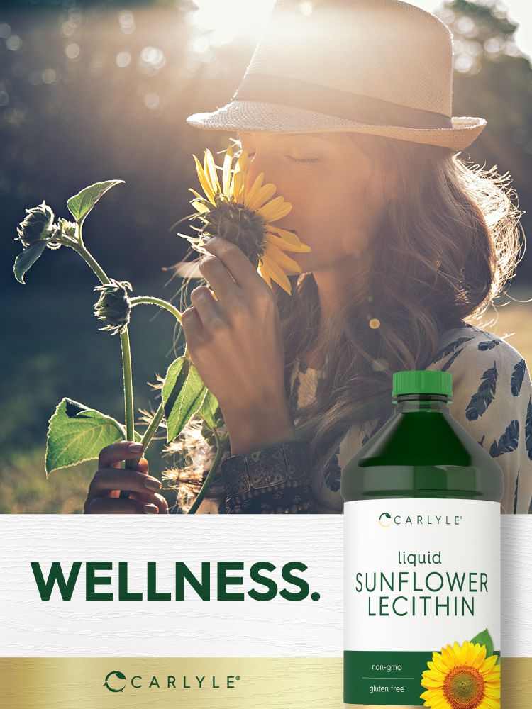 A 16 oz bottle of Carlyle Liquid Sunflower Lecithin held in a hand, highlighting its size and design.
