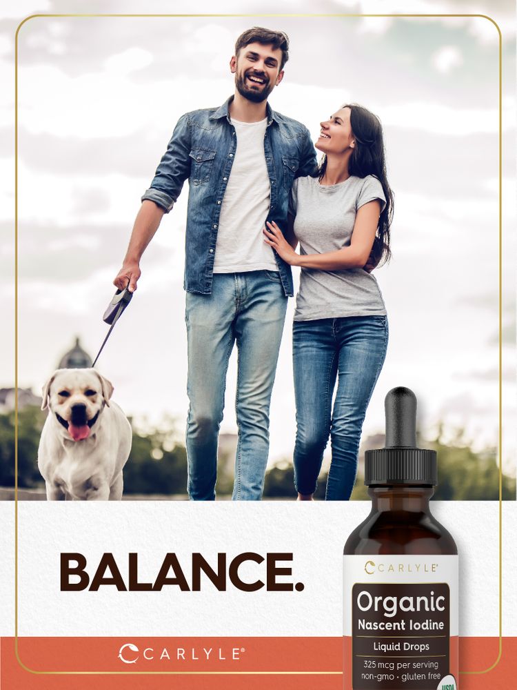 Young couple walking a dog, smiling, next to 'BALANCE.' text and a Carlyle Organic Nascent Iodine bottle.