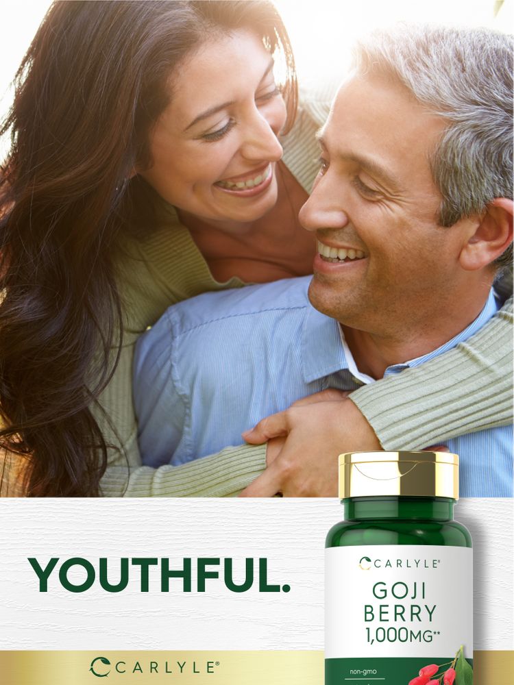 Smiling middle-aged couple embracing outdoors with a 'YOUTHFUL.' text and a Carlyle Goji Berry 1,000mg bottle in view.
