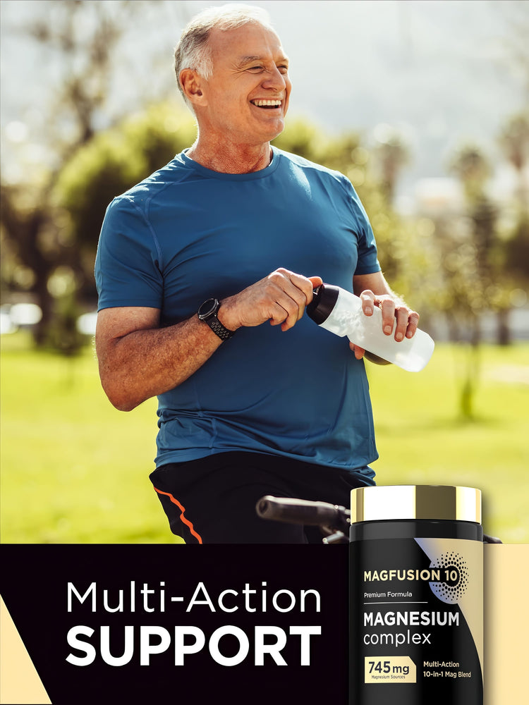 Senior man smiling outdoors, holding a water bottle, next to a bicycle and a Magfusion 10 Magnesium Complex bottle.